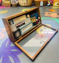Load image into Gallery viewer, Bocs Cymorth Cyntaf Vintage ‘freestanding’ pren a gwydr o ganol y ganrif ddiwethaf yn llawn deunyddiau Cymorth Cyntaf Vintage / Vintage Mid Century freestanding wood and glass First Aid box full of Vintage First Aid items