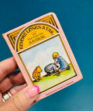 Load image into Gallery viewer, Llyfr bychan, bach ‘Eeyore Loses a Tail’ o 1973 / Tiny, tiny ‘Eeyore Loses a Tail’ book from 1973