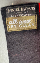 Load image into Gallery viewer, Scarff ysgol gwlan streips coch, gwyrdd, gwyn a du Vintage o ‘Daniel Thomas Outfitters Aberystwyth’ / Vintage red, green, white and black striped woolen school scarf by ‘Daniel Thomas Outfitters Aberystwyth’