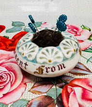 Load image into Gallery viewer, Pin cushion ‘A Present from Penmaenmawr’ ceramig Hynafol / Antique ‘A Present from Penmaenmawr’ ceramic pin cushion
