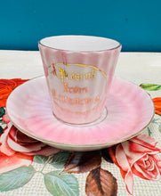 Load image into Gallery viewer, Cwpan a soser binc Hynafol ‘A present from Caernarfon’ / Antique ’A present from Caernarfon pink cup and saucer
