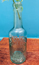 Load image into Gallery viewer, Potel Hynafol gwydr clir ‘Alf Mather Wholesale Bottler Mold’ / Antique clear glass ‘Alf Mather Wholesale Bottler Mold’ bottle
