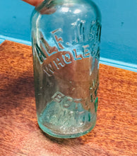 Load image into Gallery viewer, Potel Hynafol gwydr clir ‘Alf Mather Wholesale Bottler Mold’ / Antique clear glass ‘Alf Mather Wholesale Bottler Mold’ bottle
