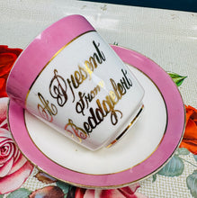 Load image into Gallery viewer, Cwpan a soser binc ‘A present from Beddgelert’ Hynafol / Antique ‘A present from Beddgelert’ pink cup and saucer
