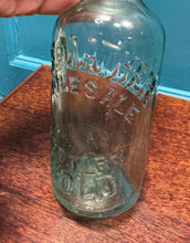 Load image into Gallery viewer, Potel Hynafol gwydr clir ‘Alf Mather Wholesale Bottler Mold’ / Antique clear glass ‘Alf Mather Wholesale Bottler Mold’ bottle
