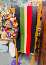 Load image into Gallery viewer, Scarff ysgol gwlan streips coch, gwyrdd, gwyn a du Vintage o ‘Daniel Thomas Outfitters Aberystwyth’ / Vintage red, green, white and black striped woolen school scarf by ‘Daniel Thomas Outfitters Aberystwyth’
