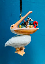 Load image into Gallery viewer, Mwclis ‘And Mary’ Pelican Llwglyd seramig mewn bocs /  ‘And Mary’ Hungry Pelican ceramic necklace in a box
