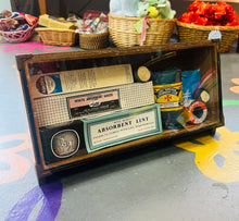 Load image into Gallery viewer, Bocs Cymorth Cyntaf Vintage ‘freestanding’ pren a gwydr o ganol y ganrif ddiwethaf yn llawn deunyddiau Cymorth Cyntaf Vintage / Vintage Mid Century freestanding wood and glass First Aid box full of Vintage First Aid items
