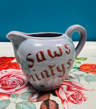 Load image into Gallery viewer, Jwg Retro ‘Saws Mintys’ Crochendu ’Doniau Cudd, Bangor’ / Retro ‘Saws Mintys’ ‘Doniau Cudd, Bangor’ pottery mint sauce jug
