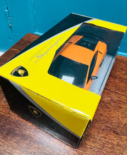 Load image into Gallery viewer, Tegan Lamborghini Gallardo Superleggera oren newydd sbon yn ei focs / Brand new Lamborghini Gallardo Superleggera orange toy in box
