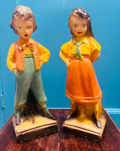 Load image into Gallery viewer, Pâr o fachgen a merch chalkware Vintage o’r 30au wedi eu peintio â llaw /
Pair of hand painted Vintage chalkware boy and girl from the 30s
