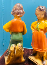 Load image into Gallery viewer, Pâr o fachgen a merch chalkware Vintage o’r 30au wedi eu peintio â llaw /
Pair of hand painted Vintage chalkware boy and girl from the 30s
