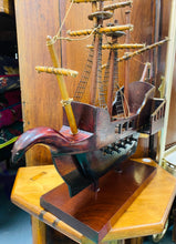 Load image into Gallery viewer, Llong pren hynafol ar stand wedi ei gwneud â llaw / Hand made Antique wooden ship on a stand
