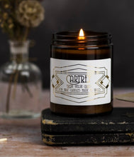 Load image into Gallery viewer, Canhwyll ‘Cartref’ arogl Cacen Gri mewn jar amber / Welsh Cake ‘Cartref’ candle in an amber jar
